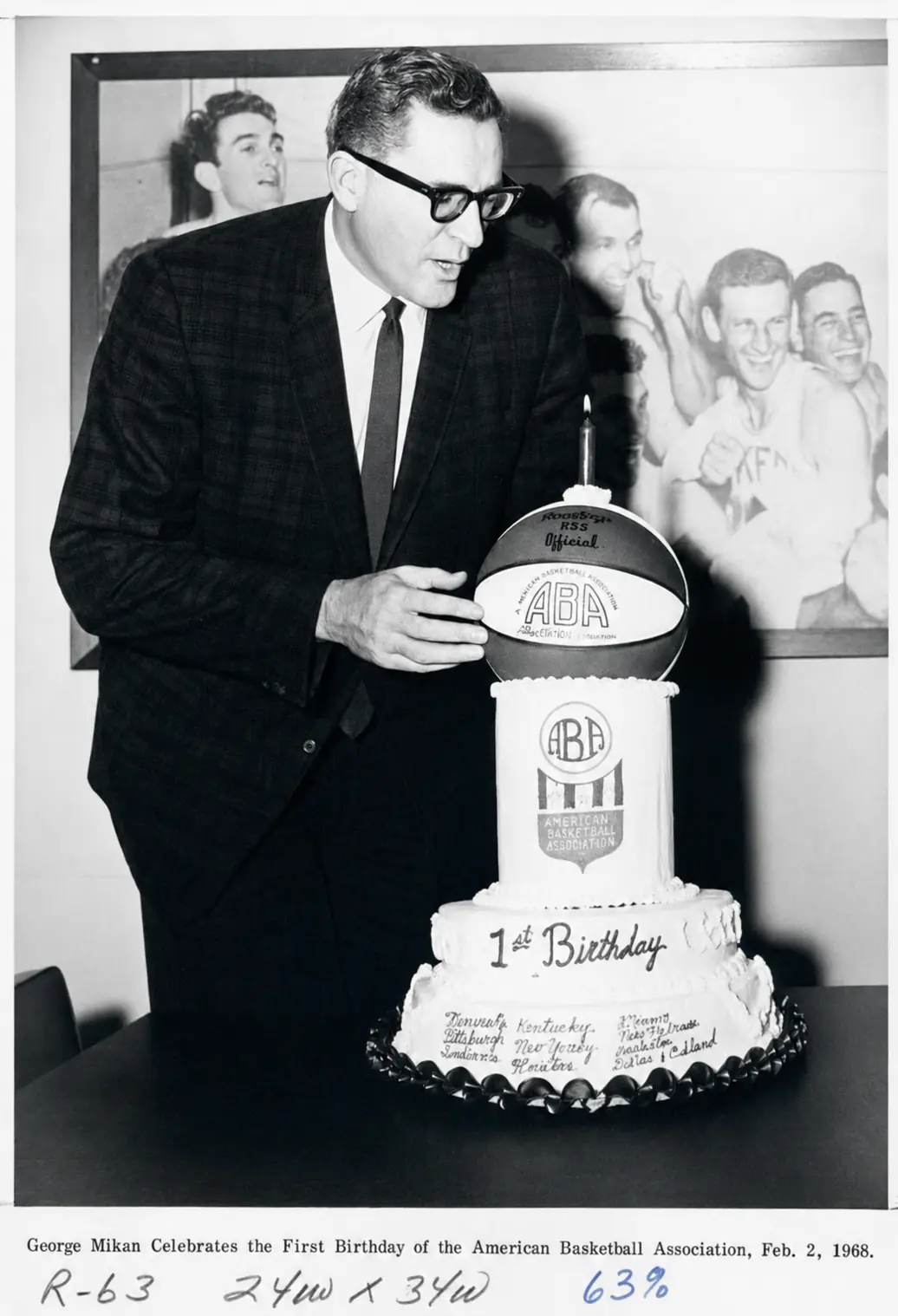 Restored archival photograph of George Mikan celebrating the American Basketball Association's first birthday in 1968